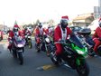 Odwiedziny „Motocykliści w strojach Świętego Mikołaja jeżdżą ulicami Wielunia i rozdają prezenty